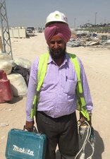 Sikh wearing hard hat on turban