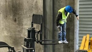Worker balancing on forklift